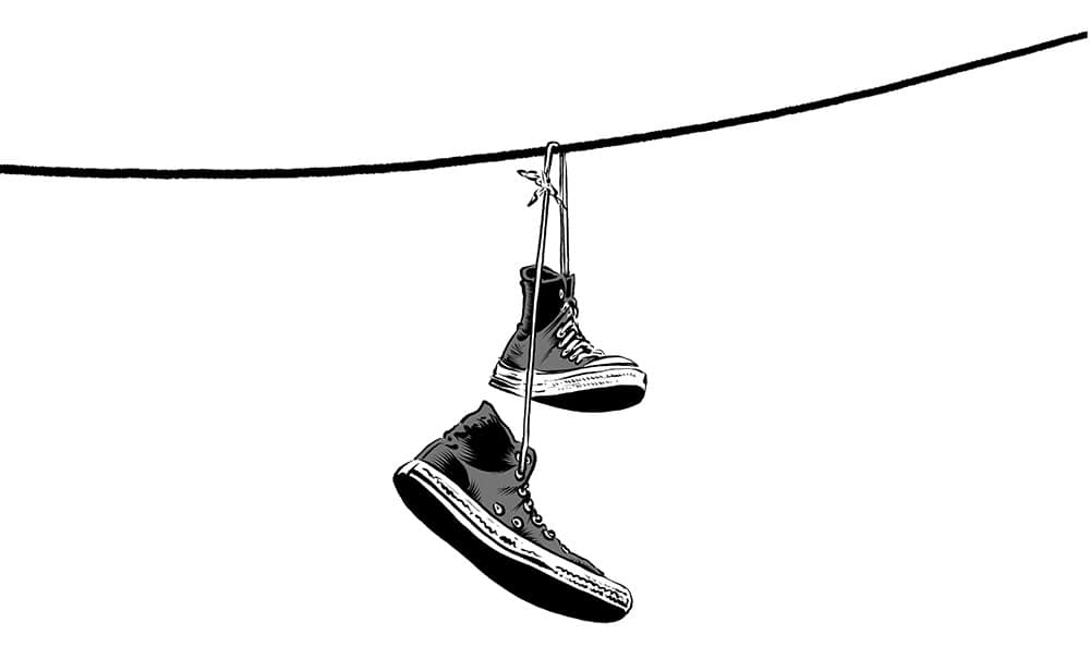 Illustration: Schwarwel, s/w, ein Sneakers-Paar hängen über einer Wäscheleine